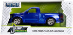 Brand new 1/24 scale diecast car model of 1999 Ford F-150 SVT Lightning Pickup Truck Candy Blue with White Stripes "Just Trucks" Series die cast model car by Jada.